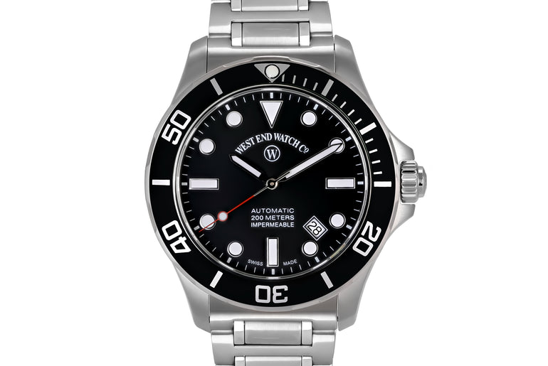 IMPERMEABLE - BLACK DIAL WITH LUMINESCENT WHITE MARKERS