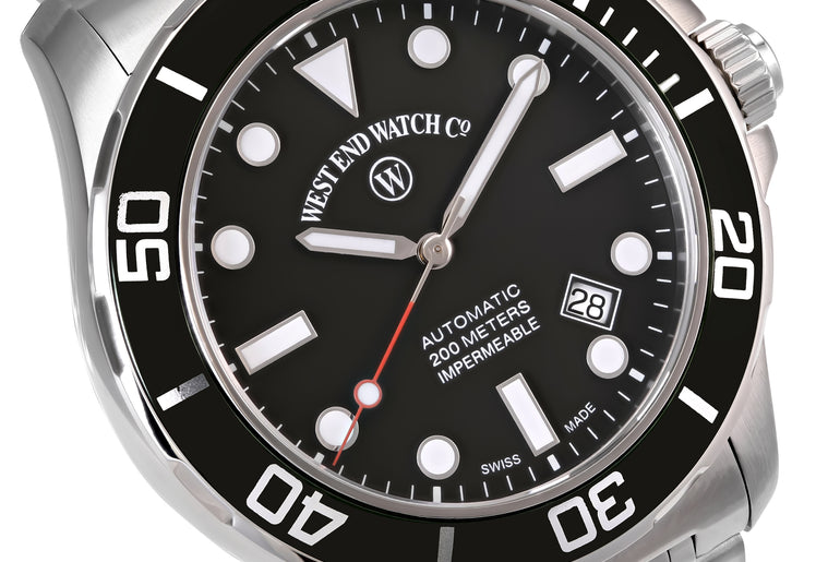 IMPERMEABLE - BLACK DIAL WITH LUMINESCENT WHITE MARKERS