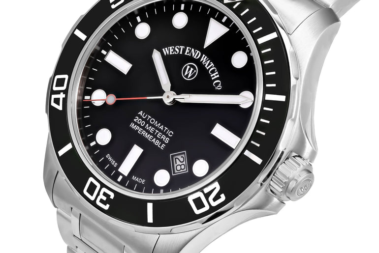 IMPERMEABLE - BLACK DIAL WITH LUMINESCENT WHITE MARKERS