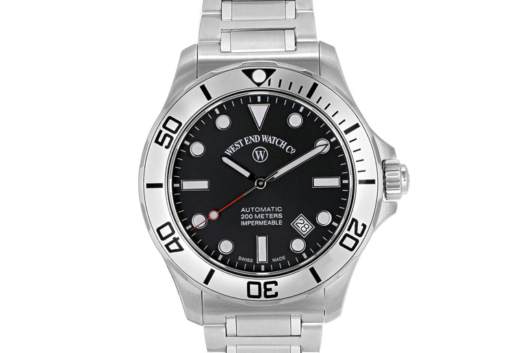 IMPERMEABLE - BLACK DIAL WITH LUMINESCENT WHITE MARKERS