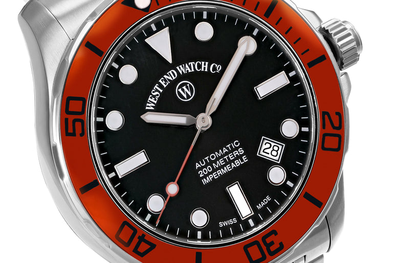 IMPERMEABLE - BLACK DIAL WITH ORANGE BEZEL