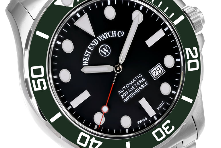 IMPERMEABLE - BLACK DIAL WITH LUMINESCENT WHITE MARKERS