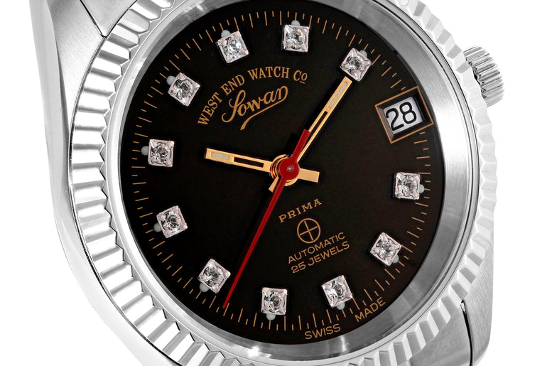 THE CLASSICS 32 - BLACK DIAL WITH ZIRCONE STONES