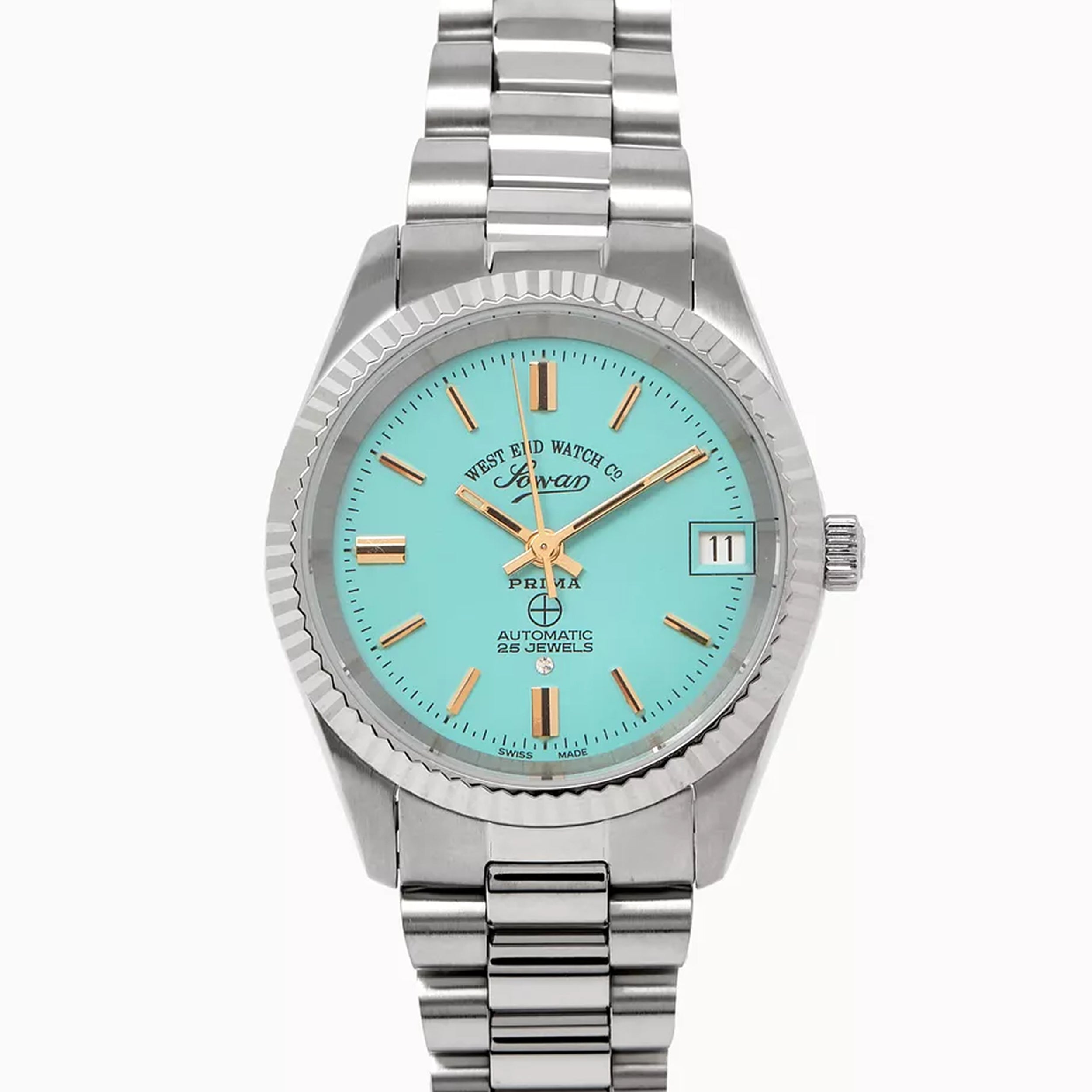 THE CLASSICS 32 - TURQUOISE DIAL W/ GOLD INDICES